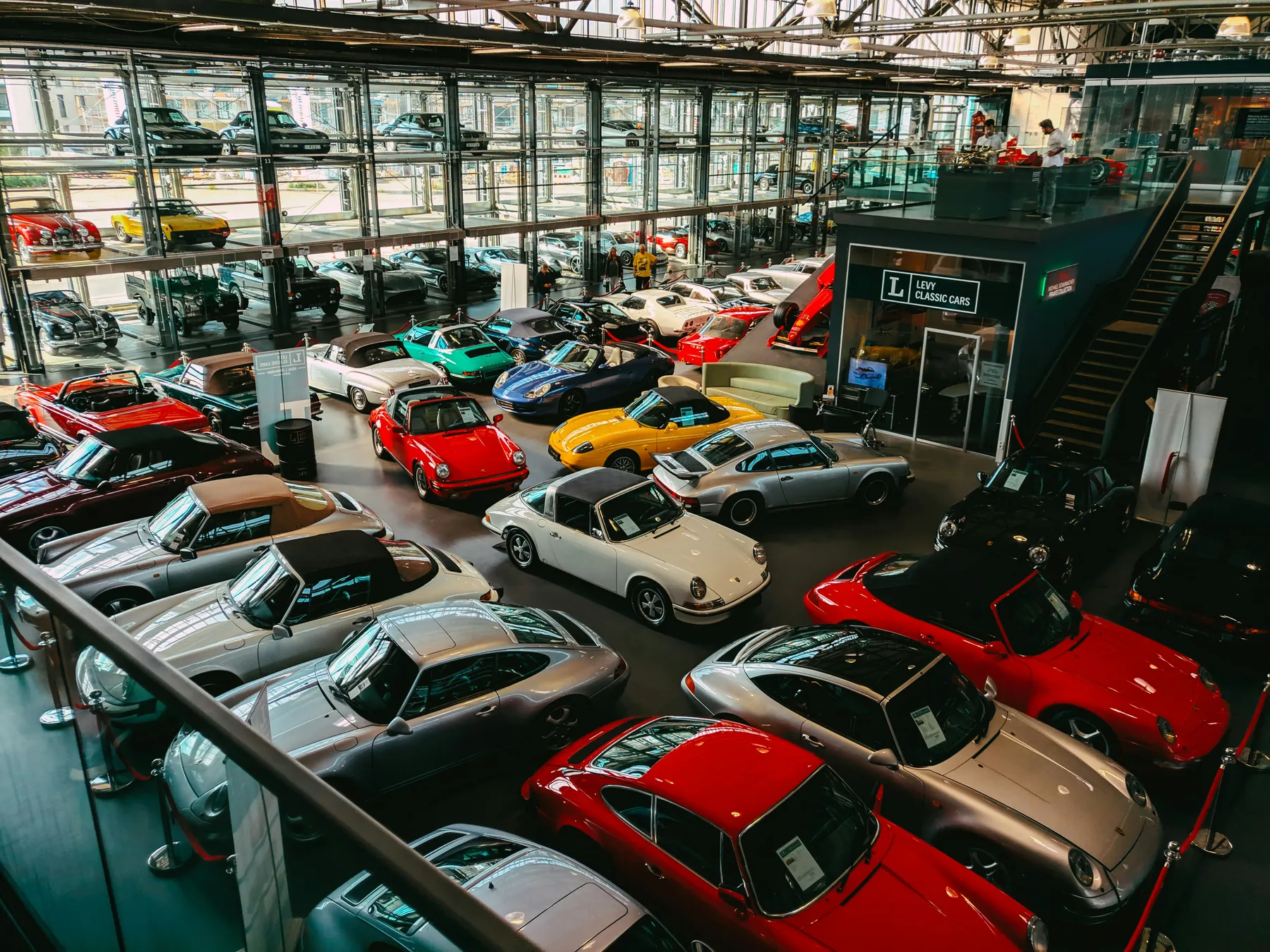Large indoor collection of cars