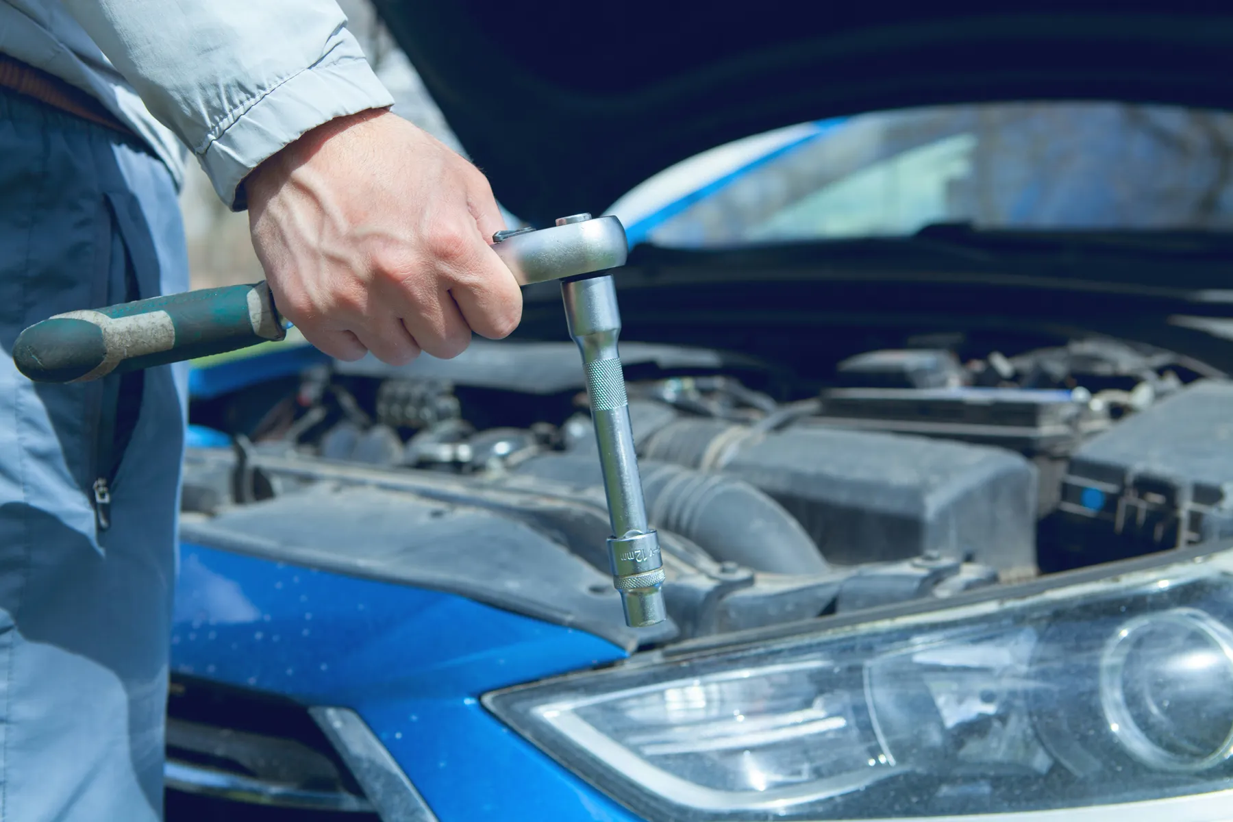 Automotive hand tool used near an engine bay